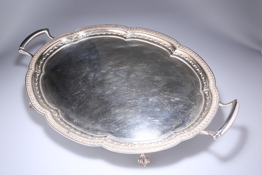 A SUBSTANTIAL SILVER TWO-HANDLED TEA TRAY