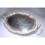 A SUBSTANTIAL SILVER TWO-HANDLED TEA TRAY