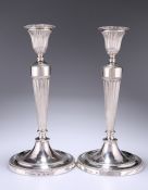 A GOOD PAIR OF GEORGE III NEO-CLASSICAL SILVER CANDLESTICKS