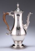 A GEORGE III SILVER COFFEE POT