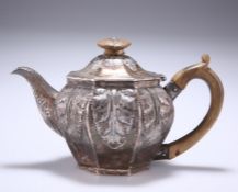 A GEORGE III SILVER TEAPOT