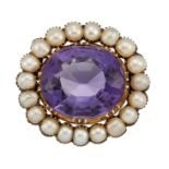 AN AMETHYST AND HALF PEARL BROOCH