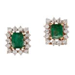 A PAIR OF EMERALD AND DIAMOND CLUSTER EARRINGS