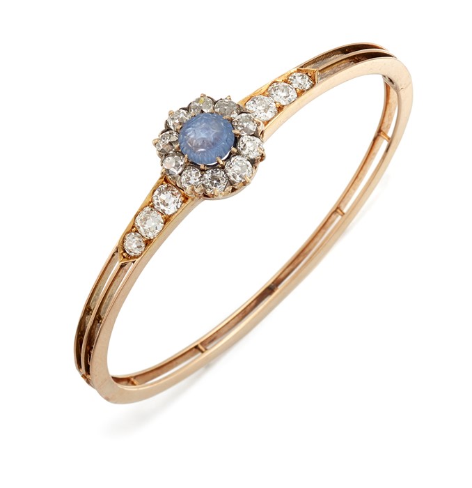 A SAPPHIRE AND DIAMOND BANGLE