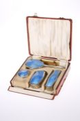 A GEORGE V SILVER AND BLUE ENAMEL DRESSING TABLE SET