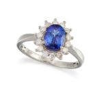 A TANZANITE AND DIAMOND CLUSTER RING