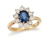 A SAPPHIRE AND DIAMOND CLUSTER RING