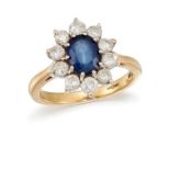 A SAPPHIRE AND DIAMOND CLUSTER RING