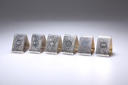 A SET OF SIX GEORGE V SILVER NAPKIN RINGS