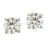 A PAIR OF DIAMOND STUD EARRINGS