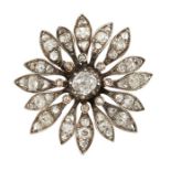 A MID 19TH CENTURY DIAMOND-SET FLOWER BROOCH