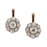 A PAIR OF DIAMOND CLUSTER EARRINGS