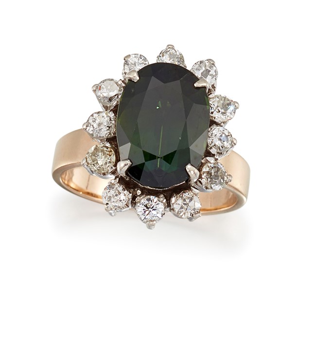 A GREEN SAPPHIRE AND DIAMOND CLUSTER RING