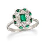 AN EMERALD AND DIAMOND RING