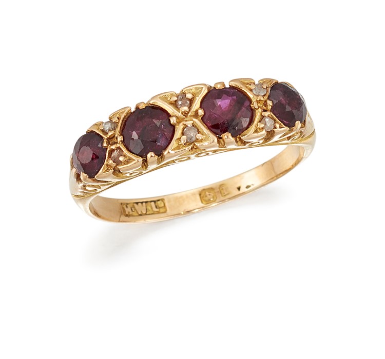 A RUBY AND DIAMOND FOUR-STONE RING