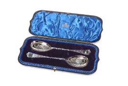 A PAIR OF LATE VICTORIAN SILVER SERVING SPOONS