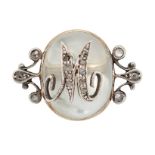 A MOONSTONE AND DIAMOND BROOCH