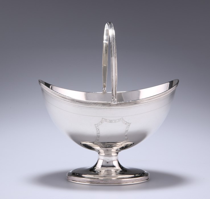 A GEORGE III SILVER SWING-HANDLED SUGAR BASKET