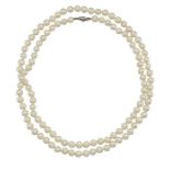 A CULTURED PEARL NECKLACE WITH A DIAMOND-SET CLASP