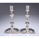 A PAIR OF GEORGE II SILVER CANDLESTICKS