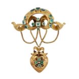 A MID 19TH CENTURY EMERALD-SET BROOCH