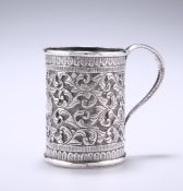 AN INDIAN WHITE-METAL MUG