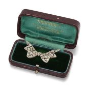 A DIAMOND BOW BROOCH, CIRCA 1920