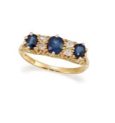 A LATE 19TH CENTURY SAPPHIRE AND DIAMOND THREE-STONE RING