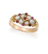 A HALF PEARL AND RUBY RING