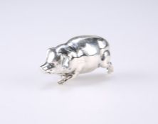 A SILVER MODEL OF A PIG