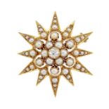 A HALF PEARL AND DIAMOND STAR BROOCH, CIRCA 1890