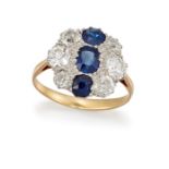 A SAPPHIRE AND DIAMOND CLUSTER RING