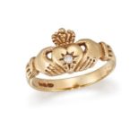 A DIAMOND-SET CLADDAGH RING