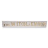 A PAINTED WOODEN SIGN, THE WITCH OF ENDOR, with raised lettering