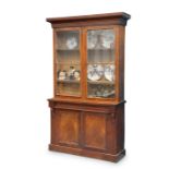 A VICTORIAN MAHOGANY BOOKCASE CABINET