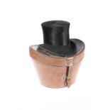 A TOP HAT BY C.J. HARDY, LEEDS, IN A LEATHER HAT BOX