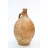 AN 18TH CENTURY STONEWARE BELLARMINE FLAGON