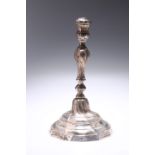 A CONTINENTAL CAST SILVER CANDLESTICK, possibly Dutch, 18th Century
