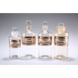 FOUR LATE VICTORIAN CLEAR GLASS LUG APOTHECARY BOTTLES