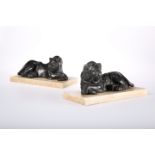 AFTER JOHN CHEERE, A PAIR OF PAINTED LEAD MODELS OF LIONS COUCHANT