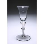 AN 18TH CENTURY WINE GLASS