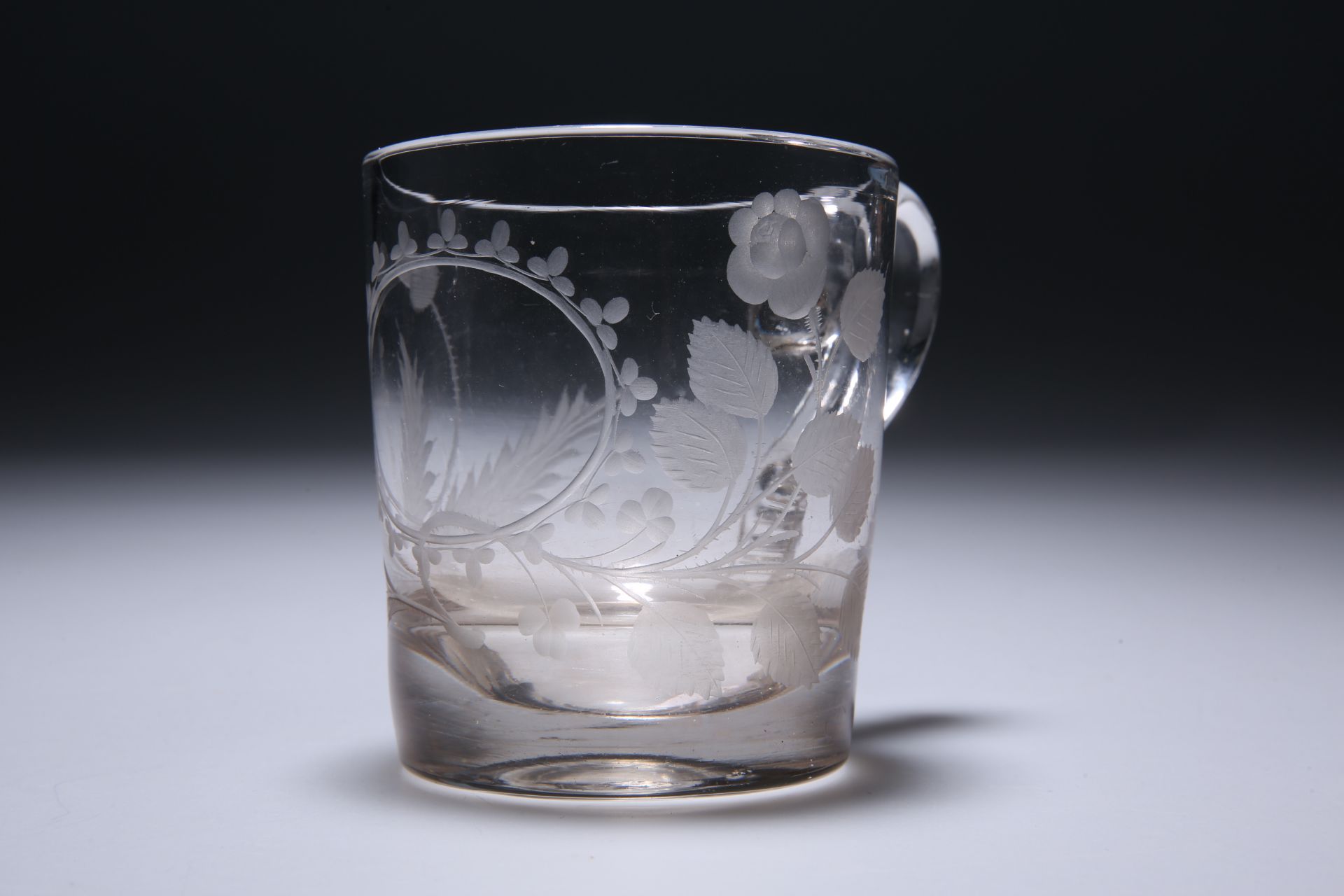 A 19TH CENTURY ACID-ETCHED MUG