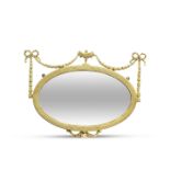 AN ADAM STYLE GILT OVAL MIRROR