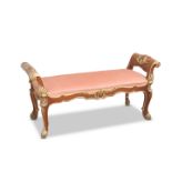A HANDSOME PARCEL-GILT WINDOW SEAT, IN LOUIS XV STYLE