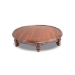 A VICTORIAN MAHOGANY LAZY SUSAN, IN THE MANNER OF GILLOWS