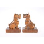 A PAIR OF EARLY 20TH CENTURY NOVELTY WOODEN BOOKENDS