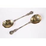 A PAIR OF VICTORIAN SILVER-GILT SERVING SPOONS