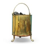 A POLISHED BRASS COAL BUCKET