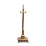 IN THE MANNER OF THOMAS HOPE, A GILT-BRASS MOUNTED MAHOGANY COAT STAND