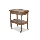 ARTHUR W. SIMPSON OF KENDAL, AN ARTS AND CRAFTS OAK SERVING TROLLEY,